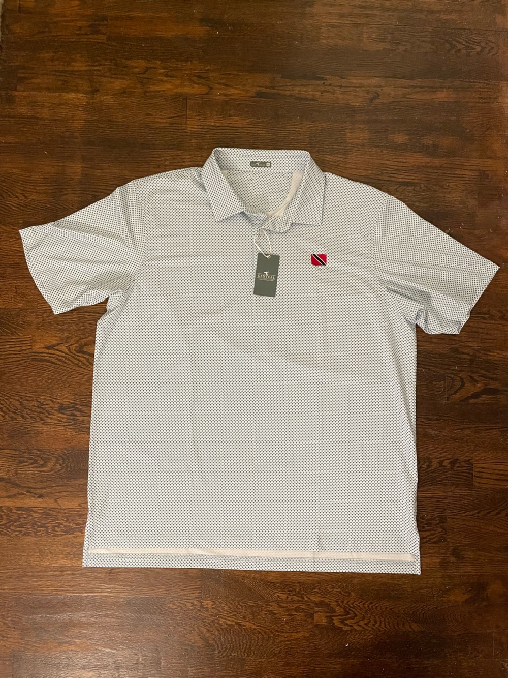 Genteal light blue Trinidad flag / Ole Miss golf polo